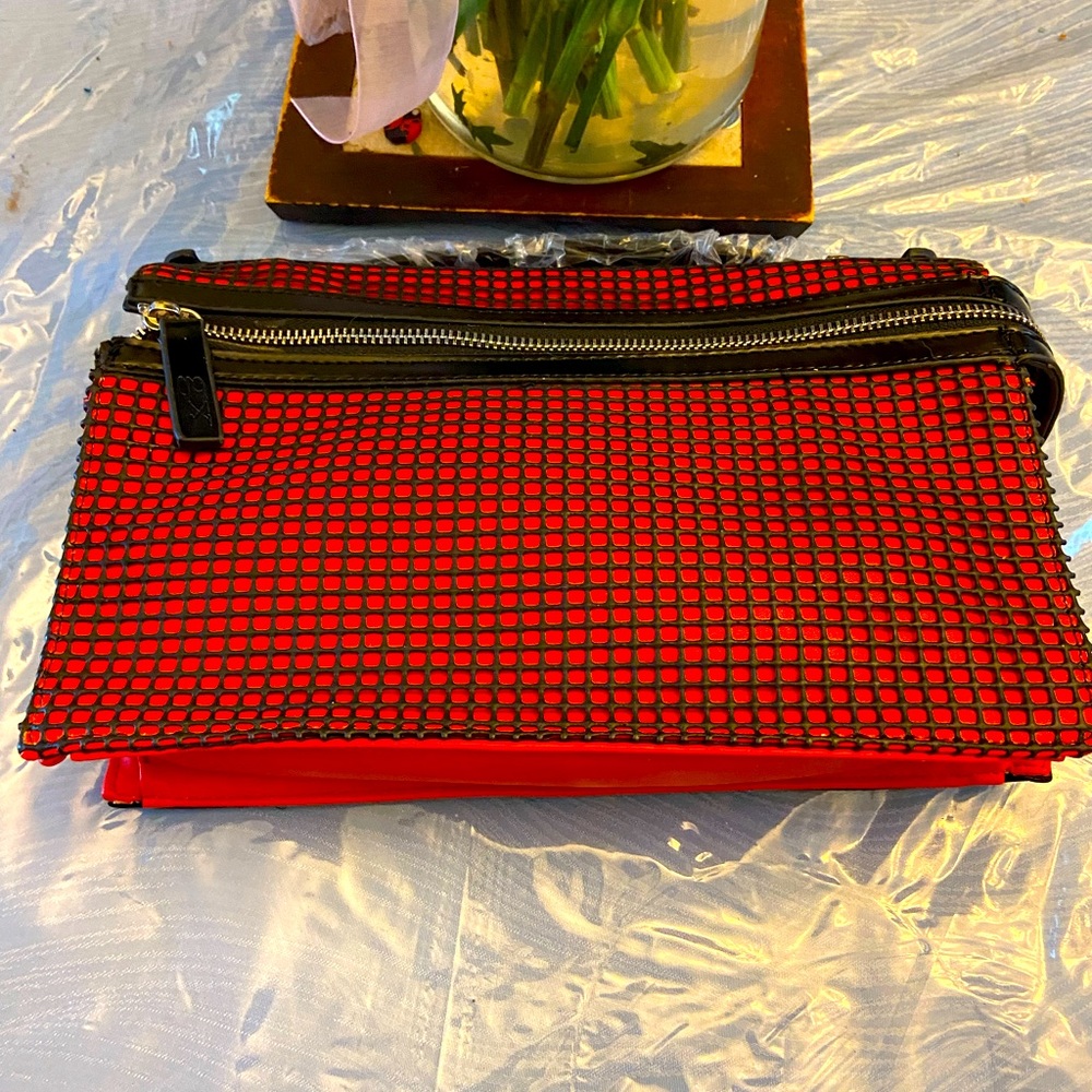 Red and black faux leather shoulder bag. NWT